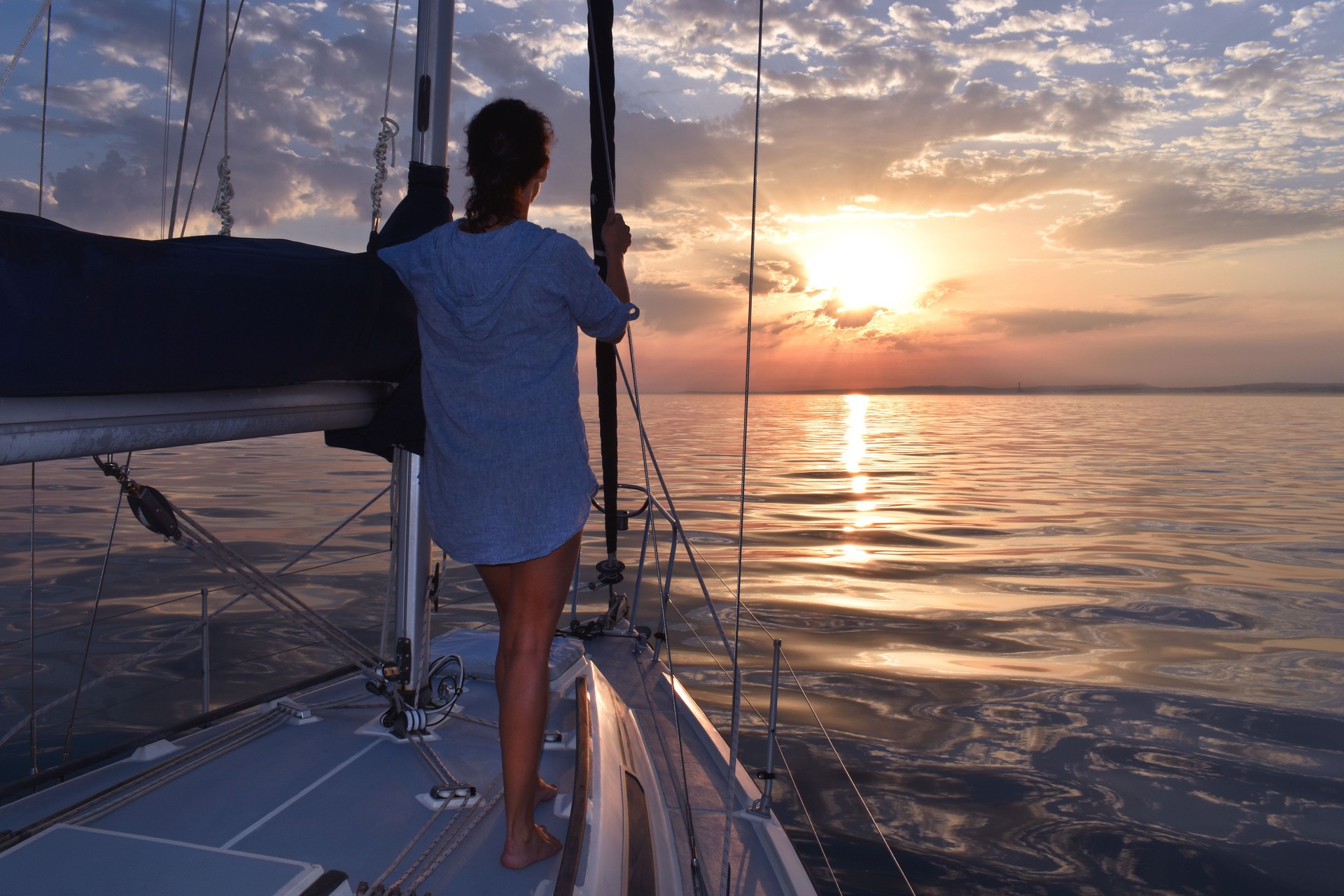 Sunset on boat with woman